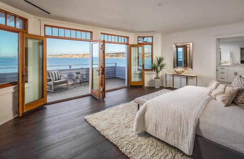 Luxurious oceanfront top-floor suite with private balcony, stunning views, fireplace, and en suite bath with tub and shower. Primary guests enjoy exclusive access to the entire floor via private elevator, offering the ultimate in privacy and comfort.