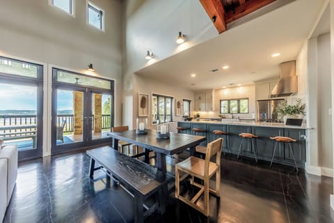 Dining table sits 8, comfortably, plus additional seating for 5 at the bar