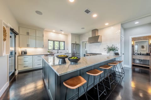 Fully equipped chefs kitchen with 6 burner gas range