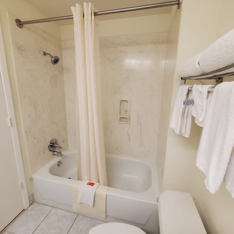 Combined shower/tub, deep soaking tub, hair dryer, towels