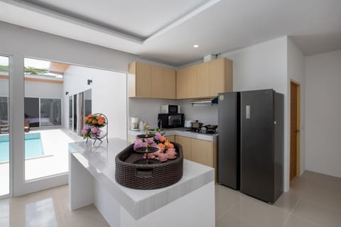 4 Bed Room pool villa | Private kitchen | Mini-fridge, coffee/tea maker, electric kettle, highchair