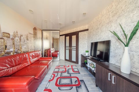 Classic Apartment | Living area | 42-inch flat-screen TV with cable channels