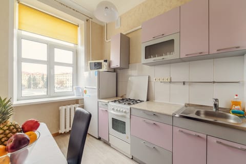 Apartment | Private kitchen | Fridge, electric kettle, cleaning supplies, paper towels