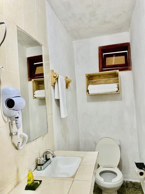 Family Room, 2 Double Beds | Bathroom | Shower, rainfall showerhead, designer toiletries, hair dryer