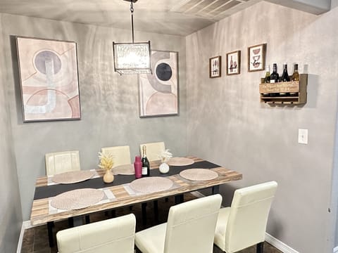 Share laughter and great food at the 6-seater dining table.