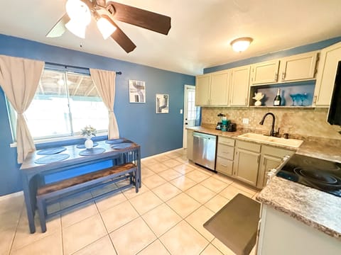 Cook Up a Storm! 🍴🔥 – Discover your inner chef in our well-stocked kitchen, featuring utensils and kitchenware. Enjoy meals with family or friends at the spacious 6-seater dining table.