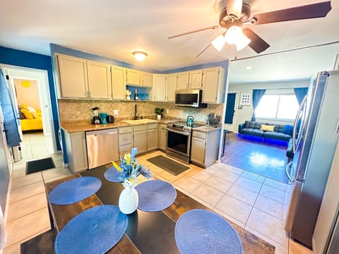 Cook Up a Storm! 🍴🔥 – Discover your inner chef in our well-stocked kitchen, featuring utensils and kitchenware. Enjoy meals with family or friends at the spacious 6-seater dining table.