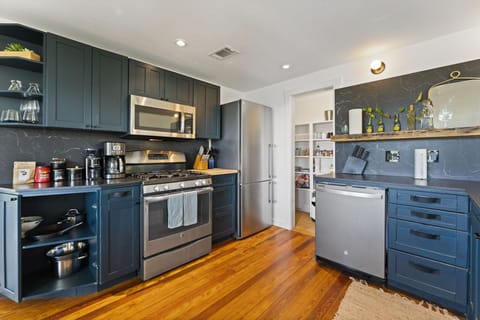 Experience culinary delight in our pristine kitchen, stocked with all the latest conveniences.