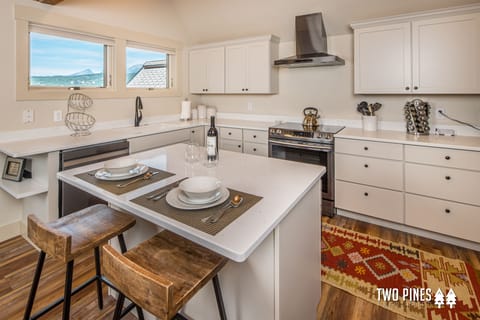 Updated Kitchen and Island with Bar Seating