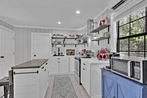 The half bath and laundry is through the door to the left off the kitchen