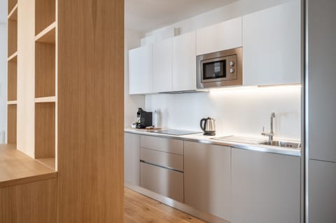 Apartment (Appartamento Monte Averau) | Private kitchen | Mini-fridge, microwave, electric kettle, toaster