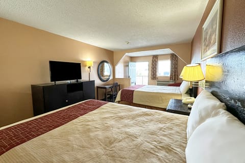 Suite, 2 Queen Beds, Non Smoking | Desk, iron/ironing board, free WiFi, bed sheets