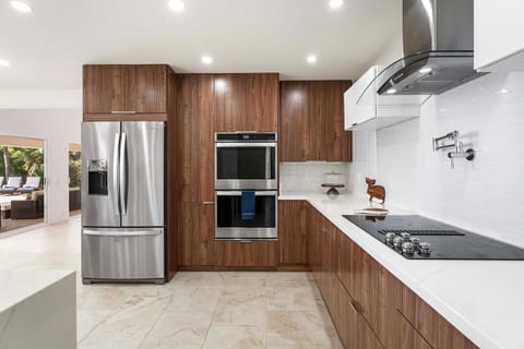 Roomy kitchen area with top-tier appliances—perfect for family cooking and island-style feasts.
