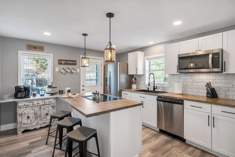 Spacious kitchen with full sized refrigerator, dishwasher, and oven/range!