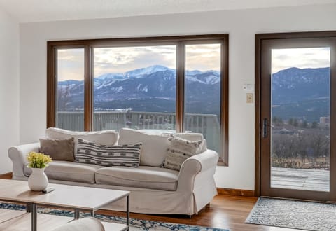Living room with Pike's Peak views, walk out to deck with full front range views