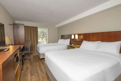 Standard Room, 2 Queen Beds, Ground Floor | Premium bedding, pillowtop beds, desk, iron/ironing board