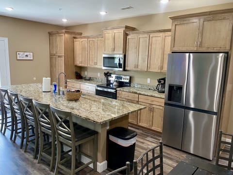 Granite,Refrigerator/Freezer,Stove/Double Oven,Microwave,2 Dishwashers,Garbage Disp.,2 Coffee Makers, Ninja Blender, Griddle, CrockPots, Almost every kitchen implement needed to make a meal.