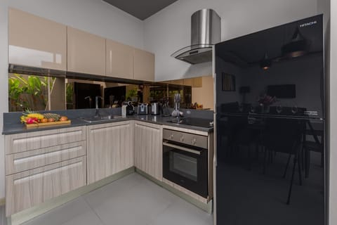 Villa | Private kitchen | Fridge, microwave, stovetop, dishwasher