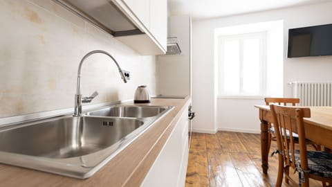 Apartment (1 Bedroom) | Private kitchen | Fridge, oven, stovetop, highchair