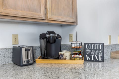 Coffee bar with an assortment of k-cups and tea.