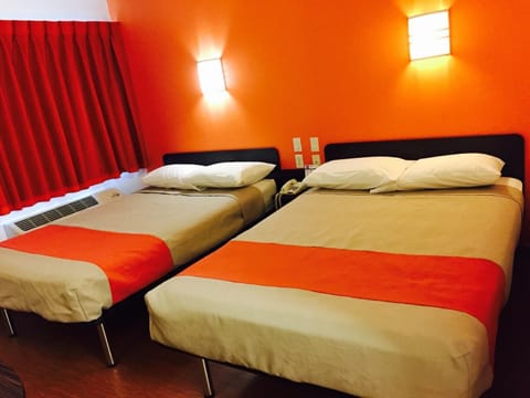Deluxe Room, 2 Double Beds, Non Smoking, Refrigerator & Microwave | Free WiFi, bed sheets