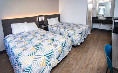 Standard Room, 2 Double Beds, Non Smoking | Free WiFi, bed sheets