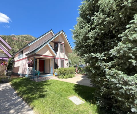 Summer exterior of Bachman Village 9 - private backyard - rare in Telluride!