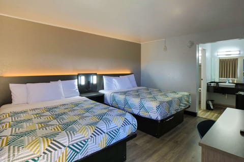 Deluxe Room, 2 Queen Beds, Non Smoking, Refrigerator & Microwave | Free WiFi, bed sheets