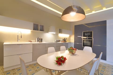 Luxury Apartment | Private kitchen | Full-size fridge, oven, stovetop, electric kettle