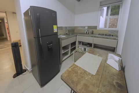 Full-size fridge, microwave, dishwasher, coffee/tea maker