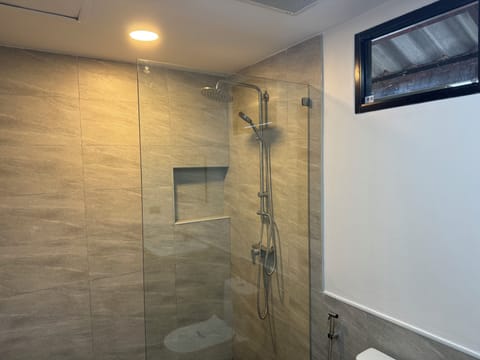 Family Room | Bathroom | Shower, rainfall showerhead, hair dryer, bathrobes