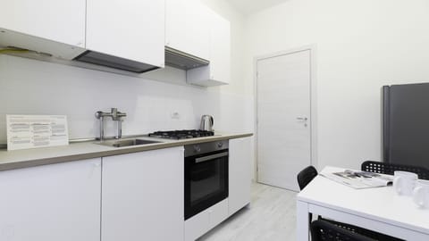 Apartment (1 Bedroom) | Private kitchen | Fridge, microwave, oven, stovetop