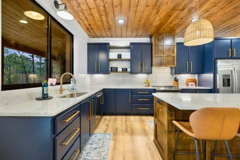 Our kitchen blends sleek design with homey comforts, the perfect recipe for memorable meal prep or casual countertop dining.