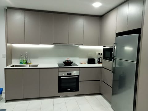 Deluxe Apartment, 2 Bedrooms | Private kitchen | Fridge, microwave, stovetop, electric kettle