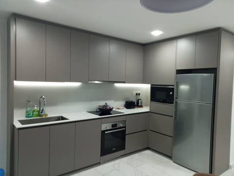 Deluxe Apartment, 2 Bedrooms | Private kitchen | Fridge, microwave, stovetop, electric kettle