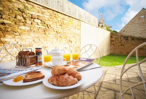 Relax in the enclosed courtyard walled garden