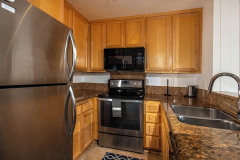 Condo, Multiple Beds, Pool Access, Garden View (B101 ) | Private kitchen | Fridge, microwave, oven, stovetop