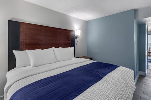 Standard Suite | 1 bedroom, in-room safe, blackout drapes, free WiFi