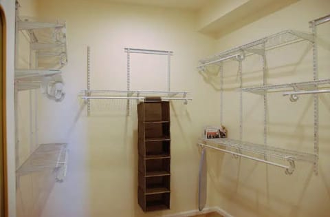 26. Walk-in closet (hers and his) in the master bedroom