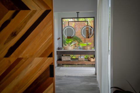 Villa | Bathroom | Shower, rainfall showerhead, hair dryer, towels