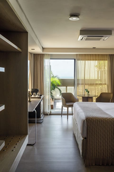 Presidential Double Room, Patio, Sea View | Premium bedding, minibar, in-room safe, individually decorated