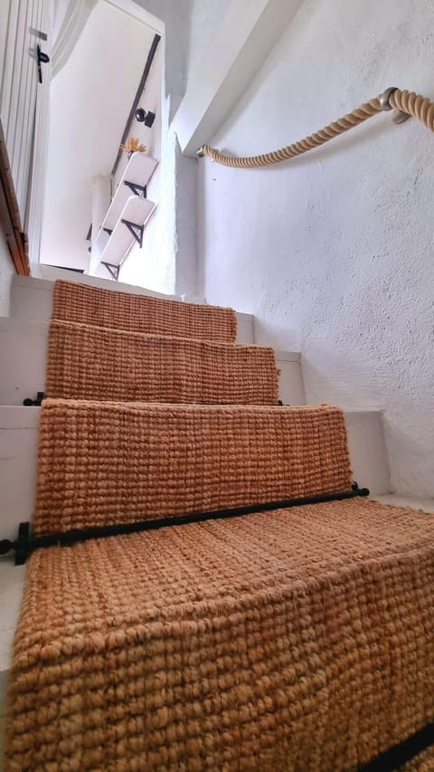 Stairs up to the summer kitchen
