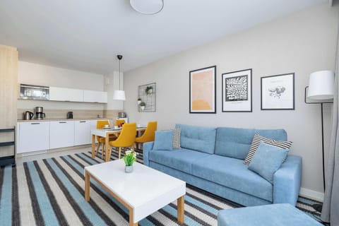 Living room with dining table and chairs.