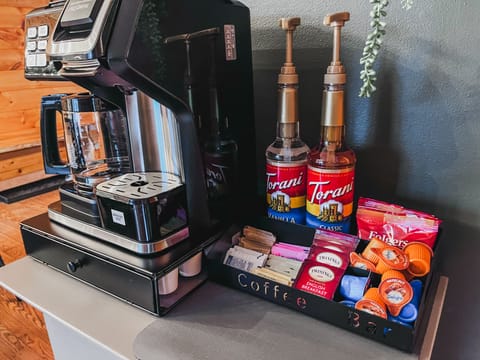 Your Morning, Your Way: At Solitude, it’s the little things that make a big difference—like this fully stocked coffee bar. With both drip and Keurig options, a variety of coffee and tea, creamers, and syrups, your perfect cup is always within reach.