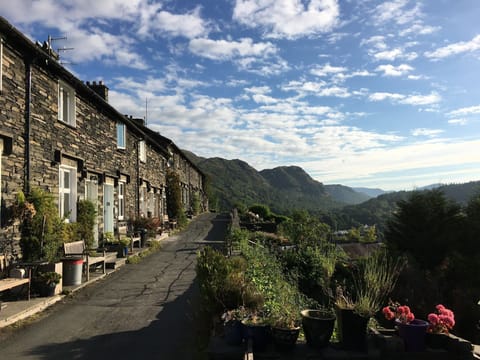 Bramble Cottage Coniston external front with mountain backdrop