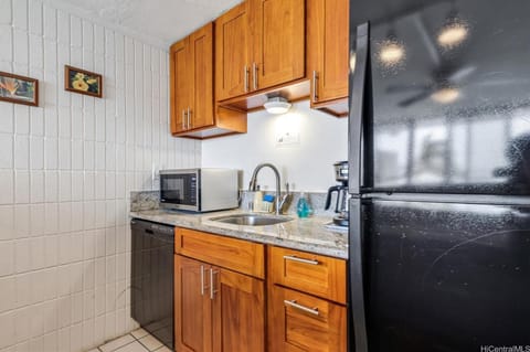 Luxury Condo | Private kitchen | Full-size fridge, microwave, oven, stovetop