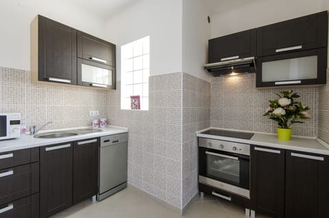 Superior Apartment, 2 Bedrooms | Private kitchen | Fridge, microwave, stovetop, dishwasher