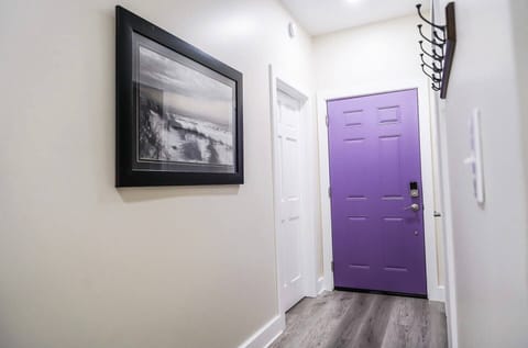Purple door entrance from home