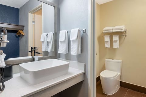 Standard Room, 2 Queen Beds, Non Smoking, Refrigerator & Microwave | Bathroom | Combined shower/tub, free toiletries, hair dryer, towels