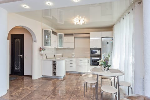 Apartment | Private kitchen | Fridge, electric kettle, freezer, paper towels